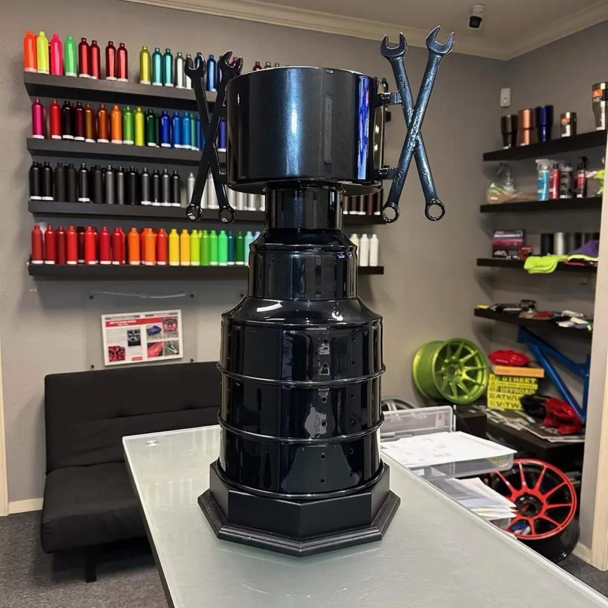 Antique hand well pump refinished in gloss black for the Plano Rotary Club.
