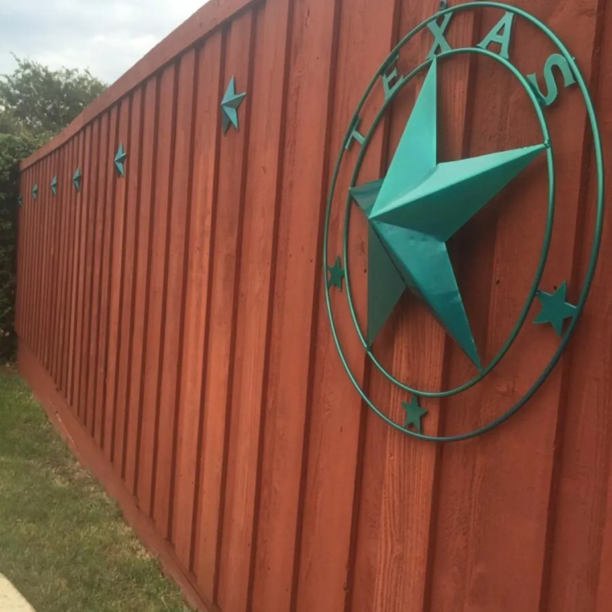 Cast Texas stars in teal for a wood fence.