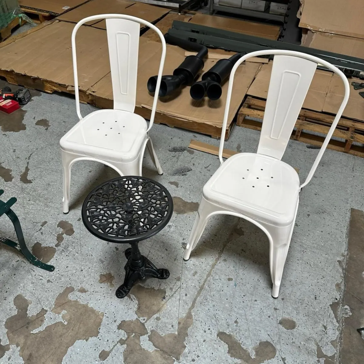 Steel cafe chairs in gloss white.