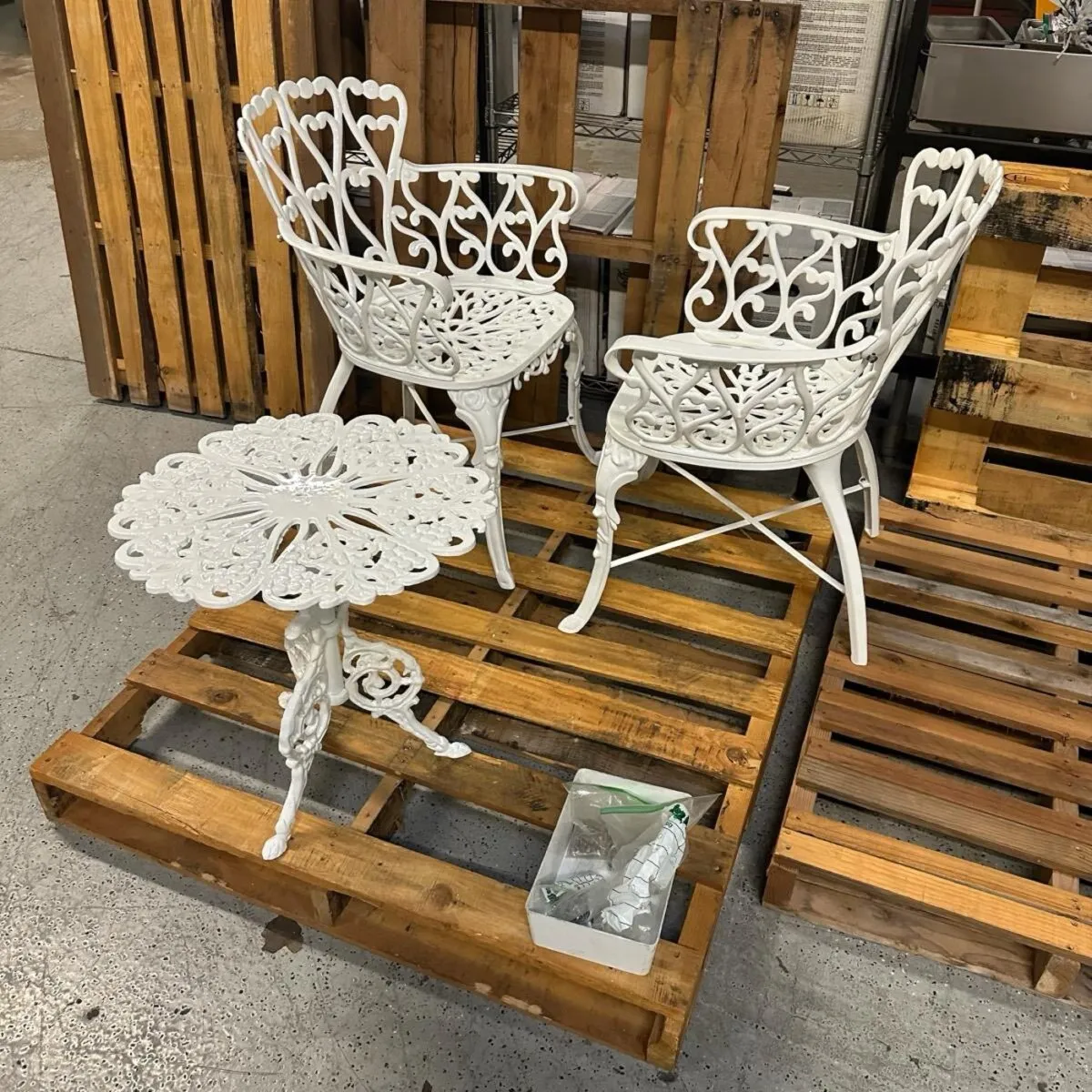 Cast iron bistro set in gloss white.