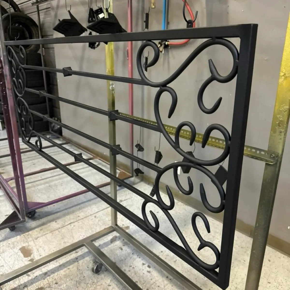 Wrought iron gate section in satin black.