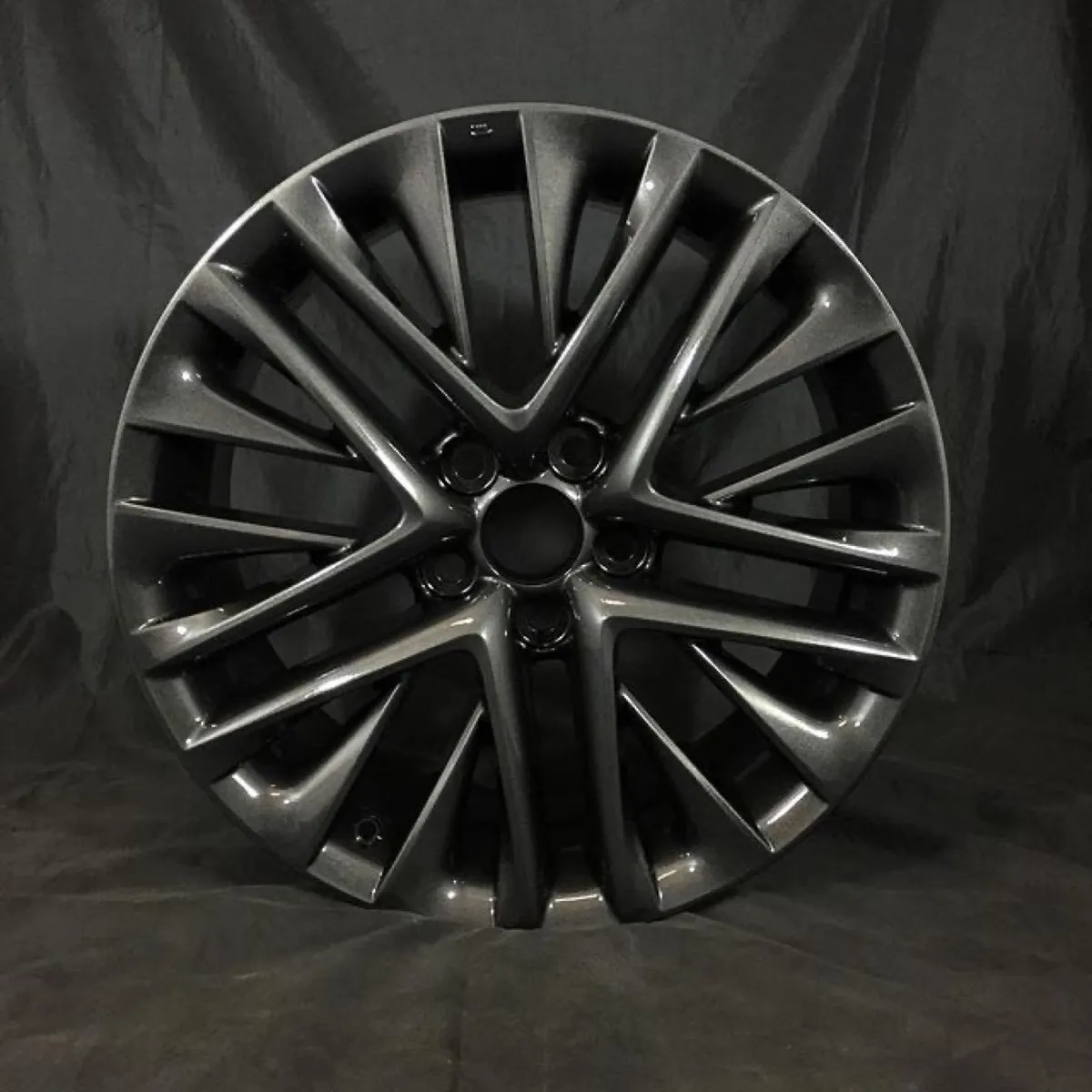 Multi-spoke wheel in satin black.