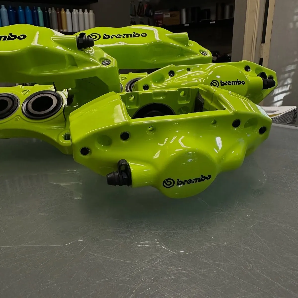 Subaru STI calipers in Manta Green with high gloss clear.