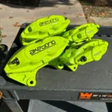 Akebono calipers in Chartreuse Sherbert.