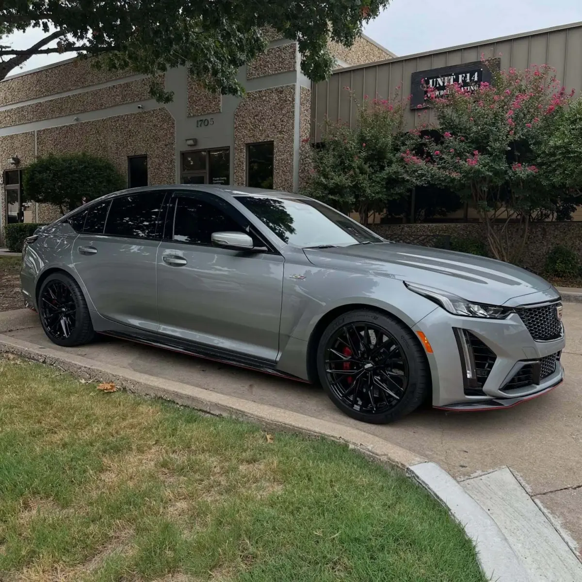 Cadillac CTS-V wheels powder coated Wet Black paired with Black Chrome lug nuts