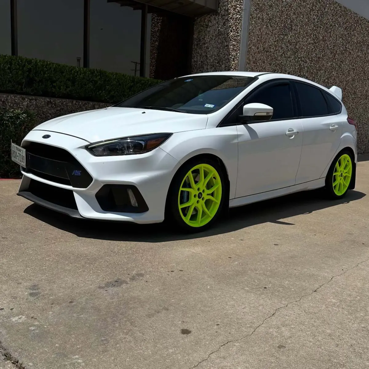 Ford focus wheels powder coated in Neon Yellow with High Gloss Clear