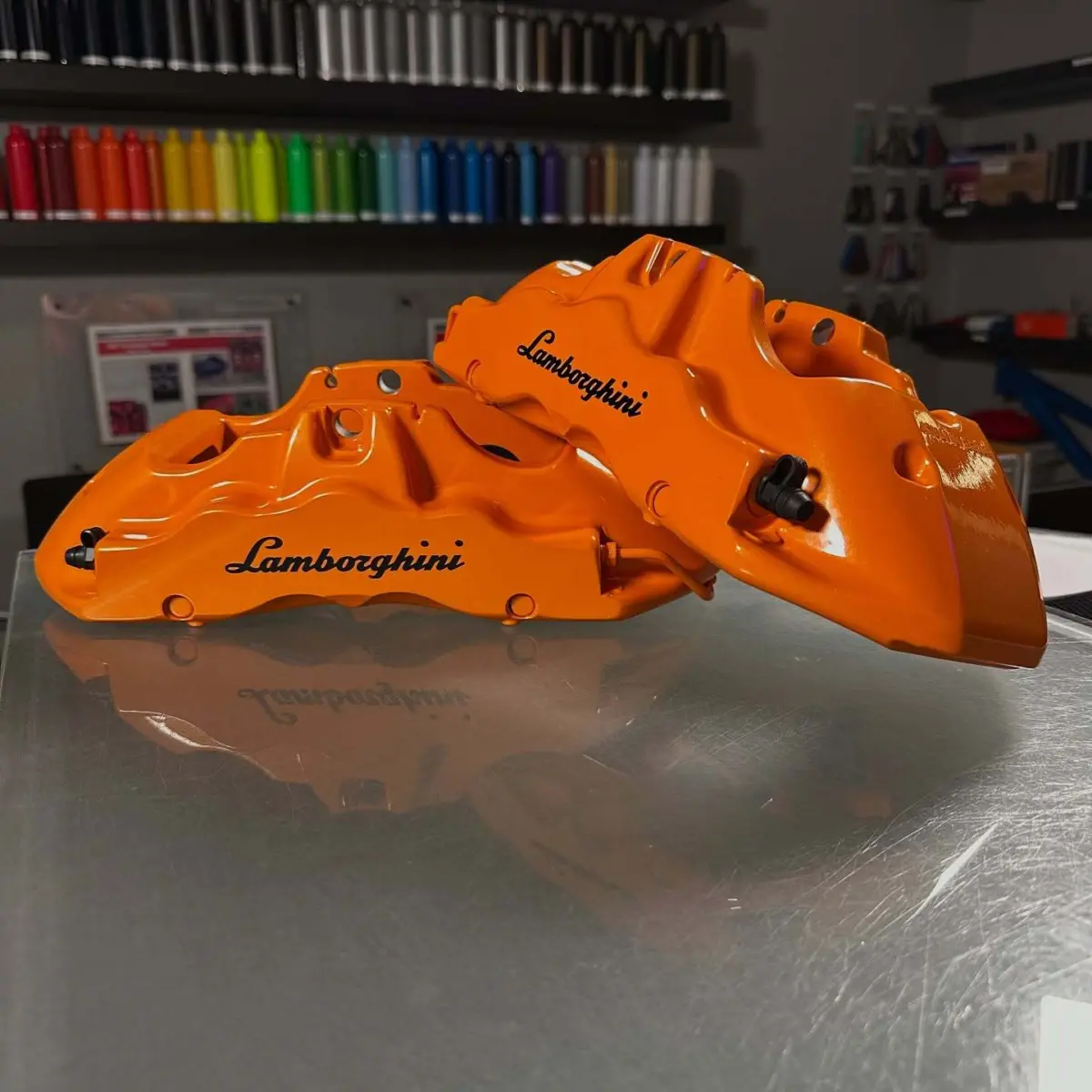 Lamborghini brake calipers powder coated Sunkist Orange with High Gloss Clear