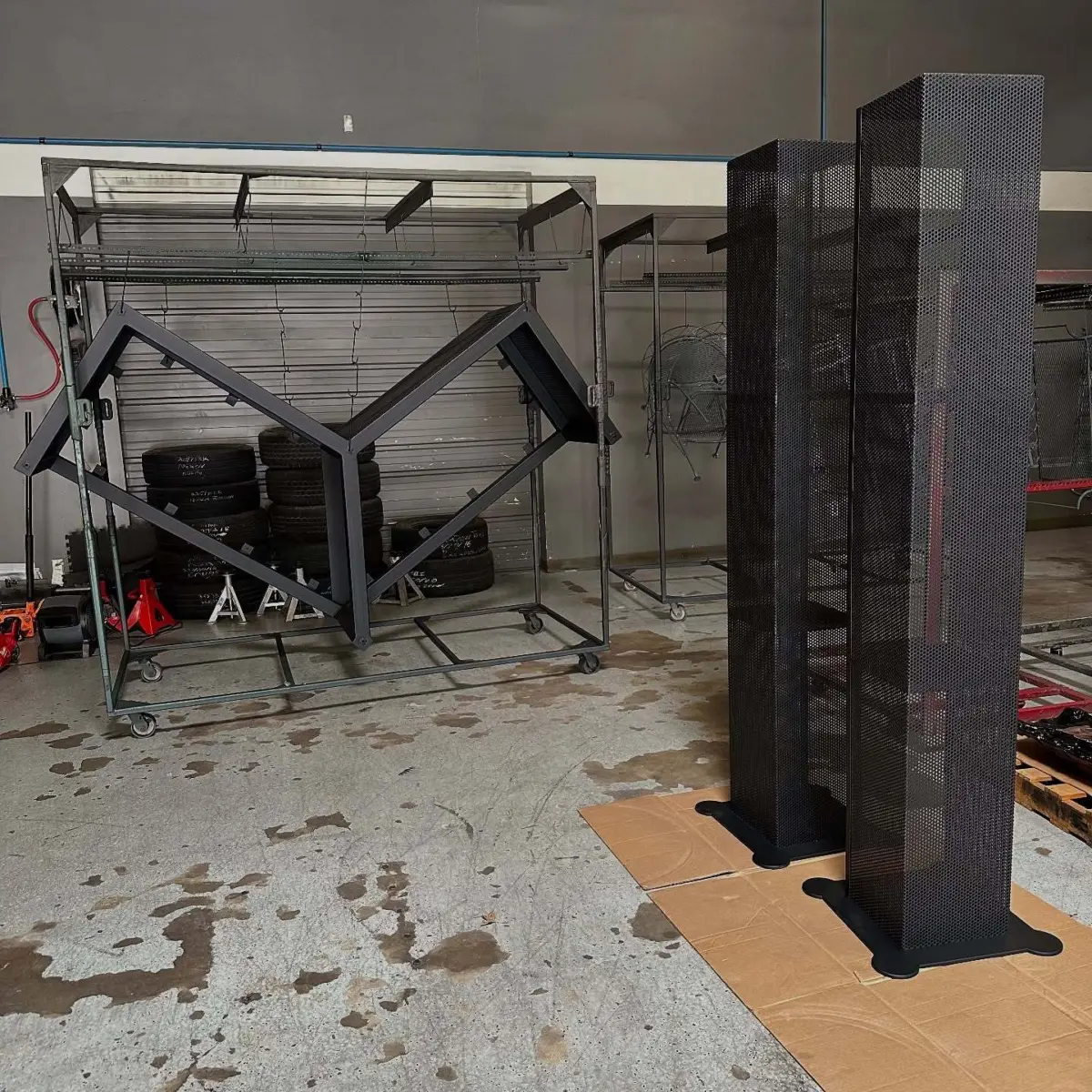 Desk and electronics storage towers sandblasted and powder coated with zinc primer and texture black
