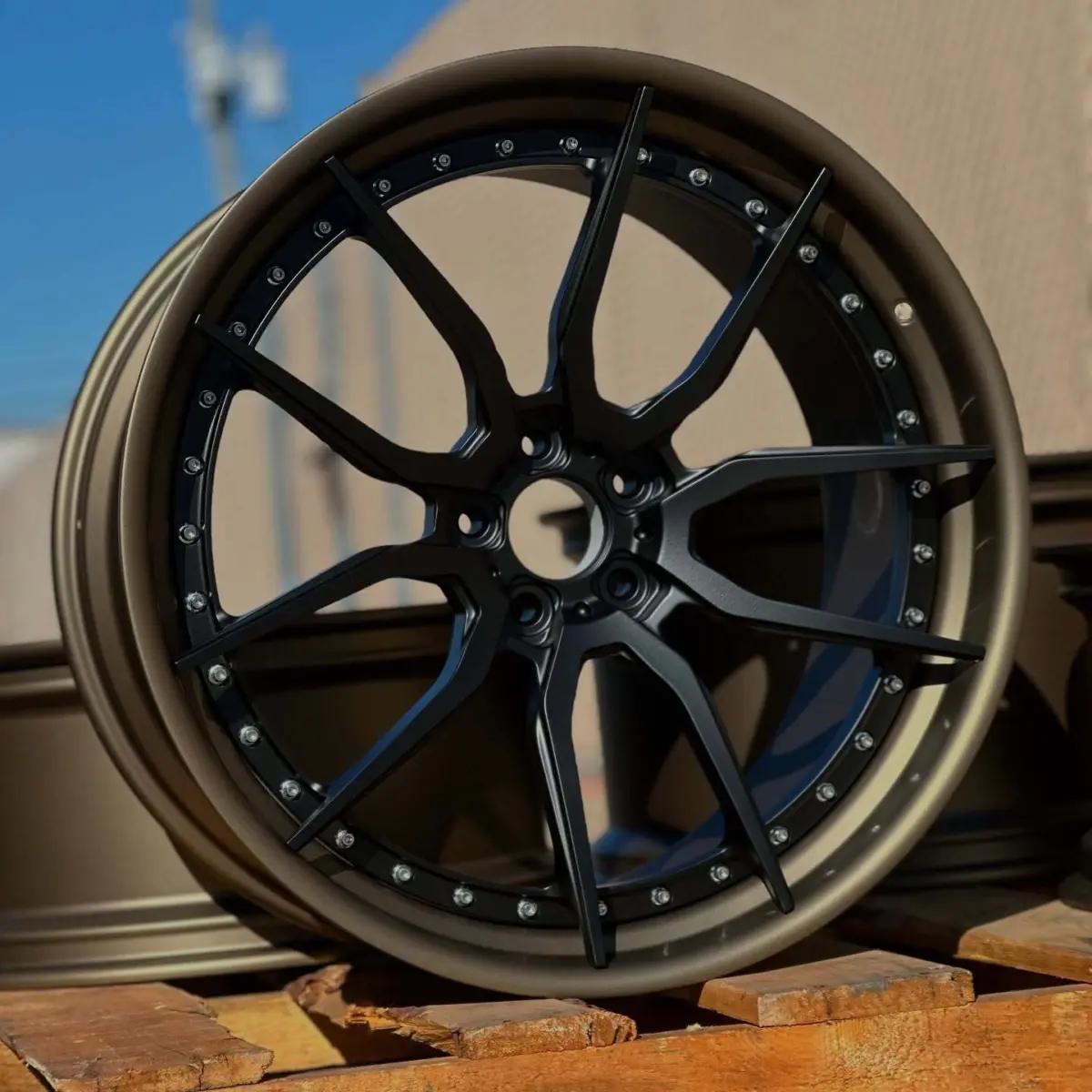 Multipiece wheels rebuilt and powder coated in matte bronze and denim black
