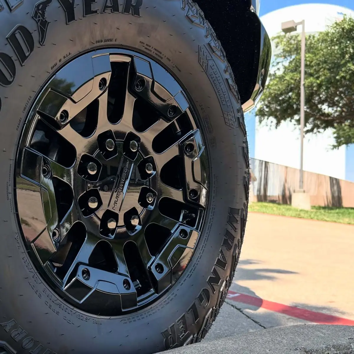 Hummer EV wheels refinished in Wet Black