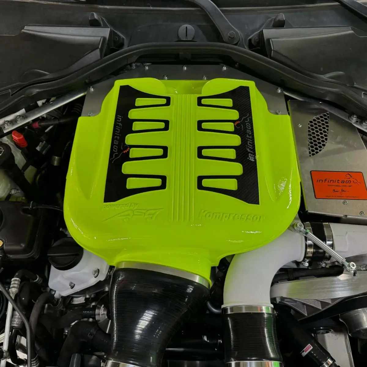 Super charger and intake piping powder coated in Neon Yellow and Bengal White for @mporium_bmw