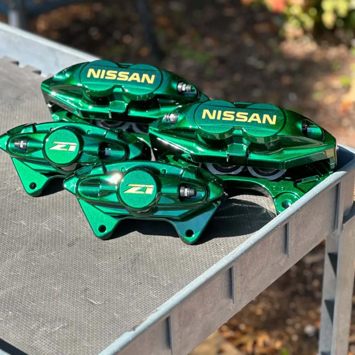 Nissan Z1 brake calipers rebuilt and powder coated Illusion Green