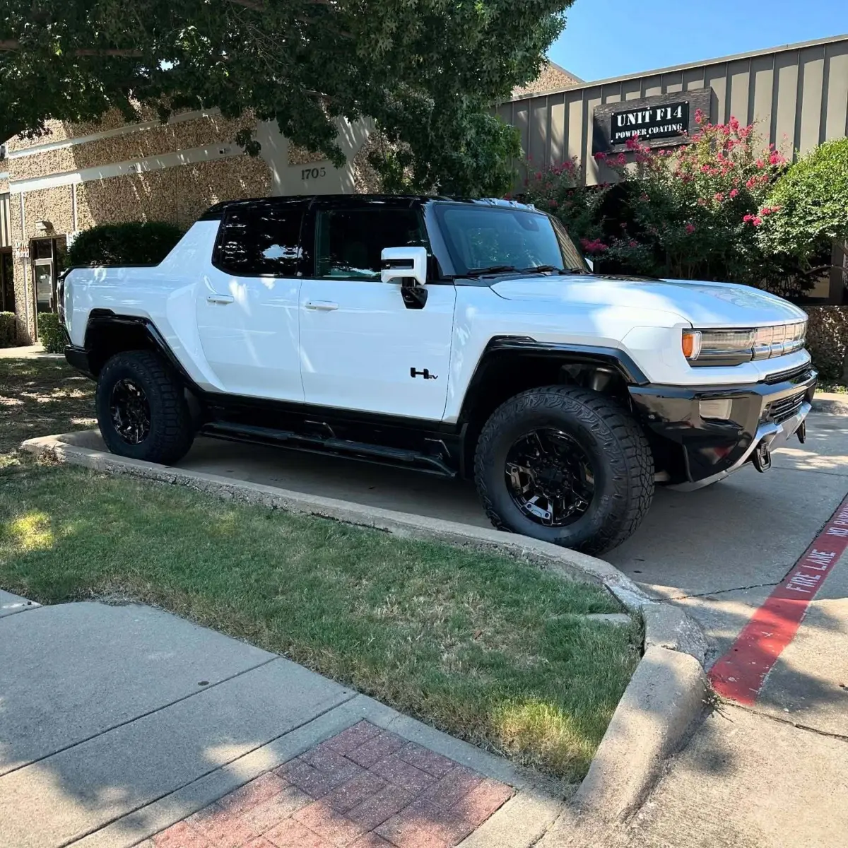 GMC Hummer EV wheels refinished in Wet Black
