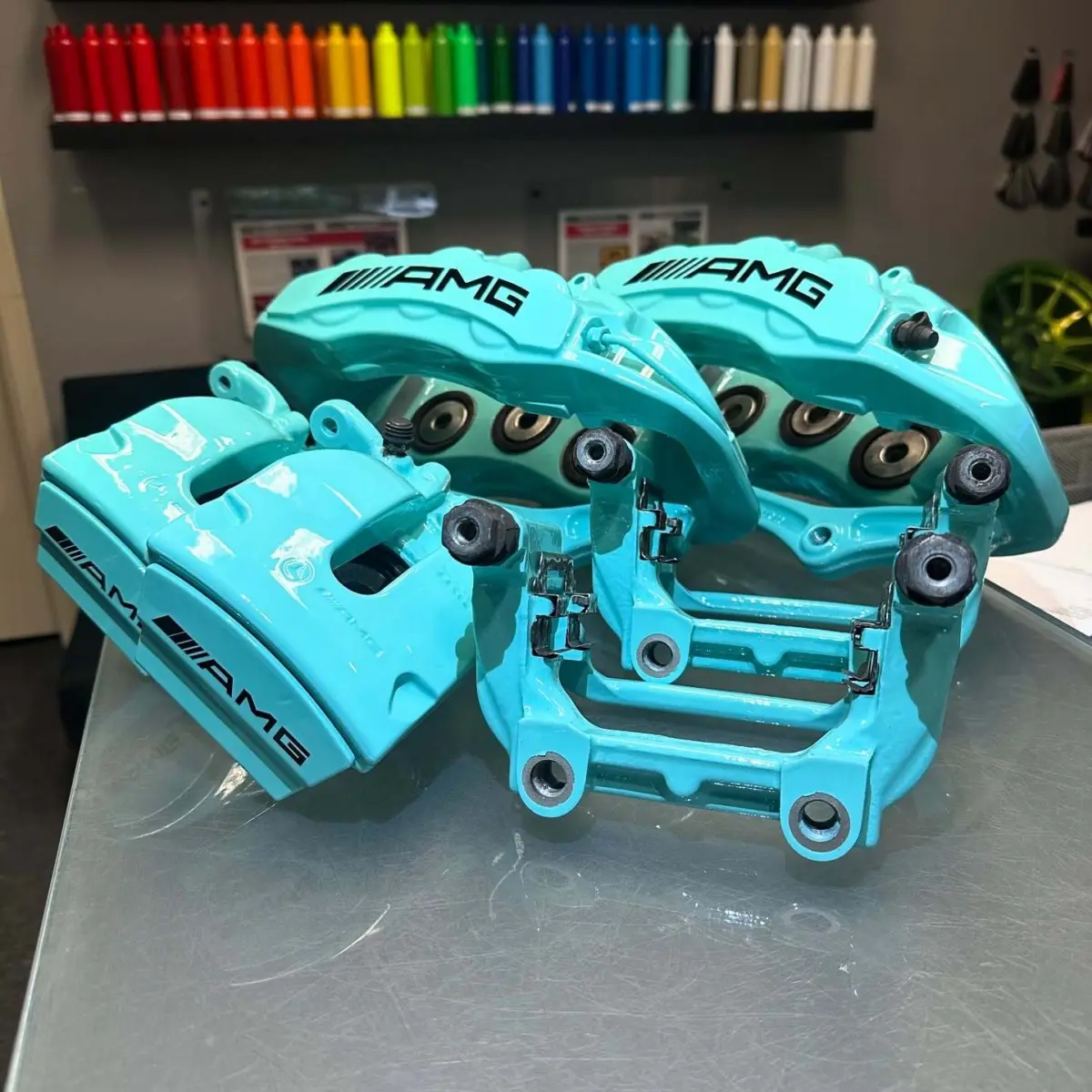 Mercedes brake calipers refinished in Tiffany Blue with High Gloss Clear