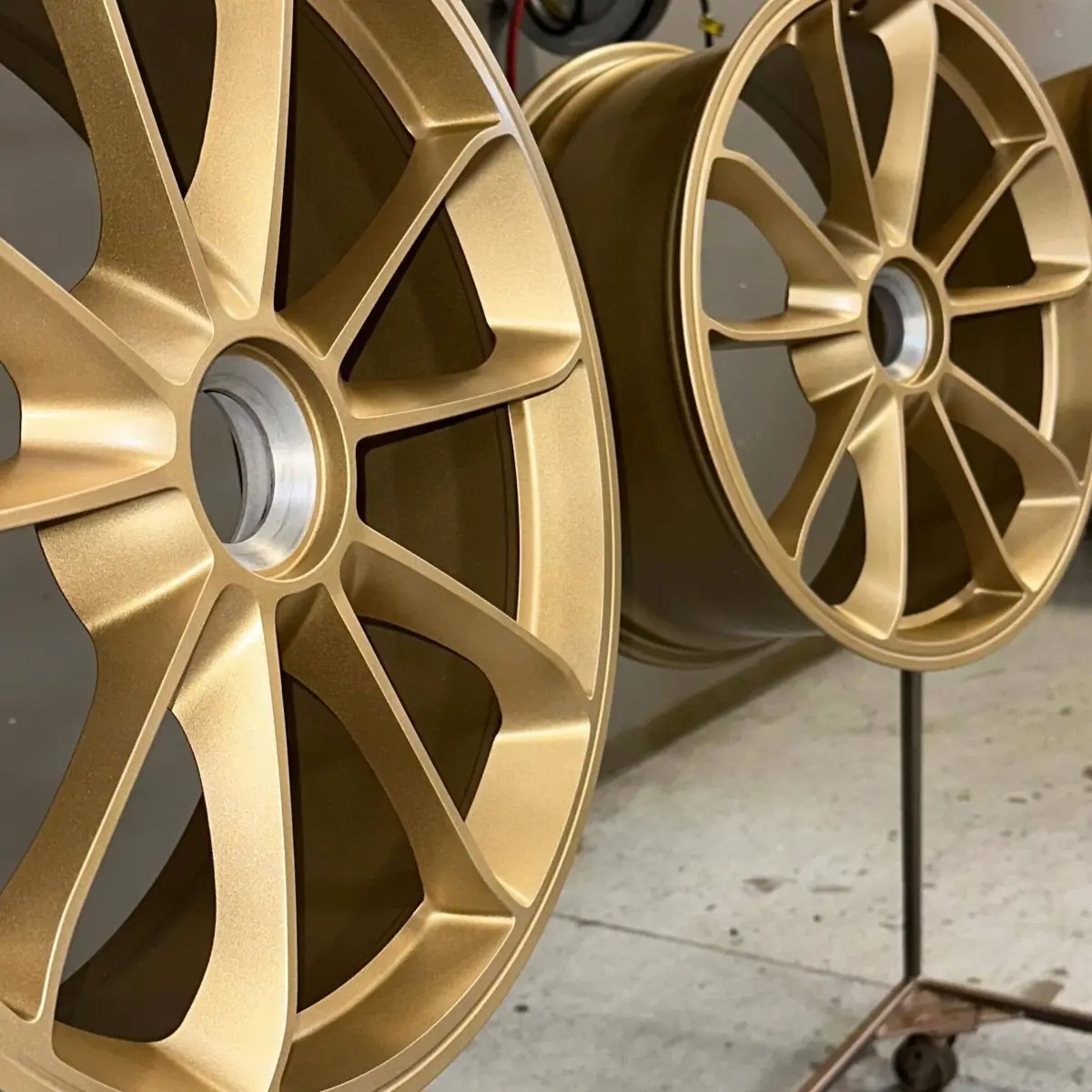 Porsche center lock wheels refinished in Waltz Gold with Satin Clear