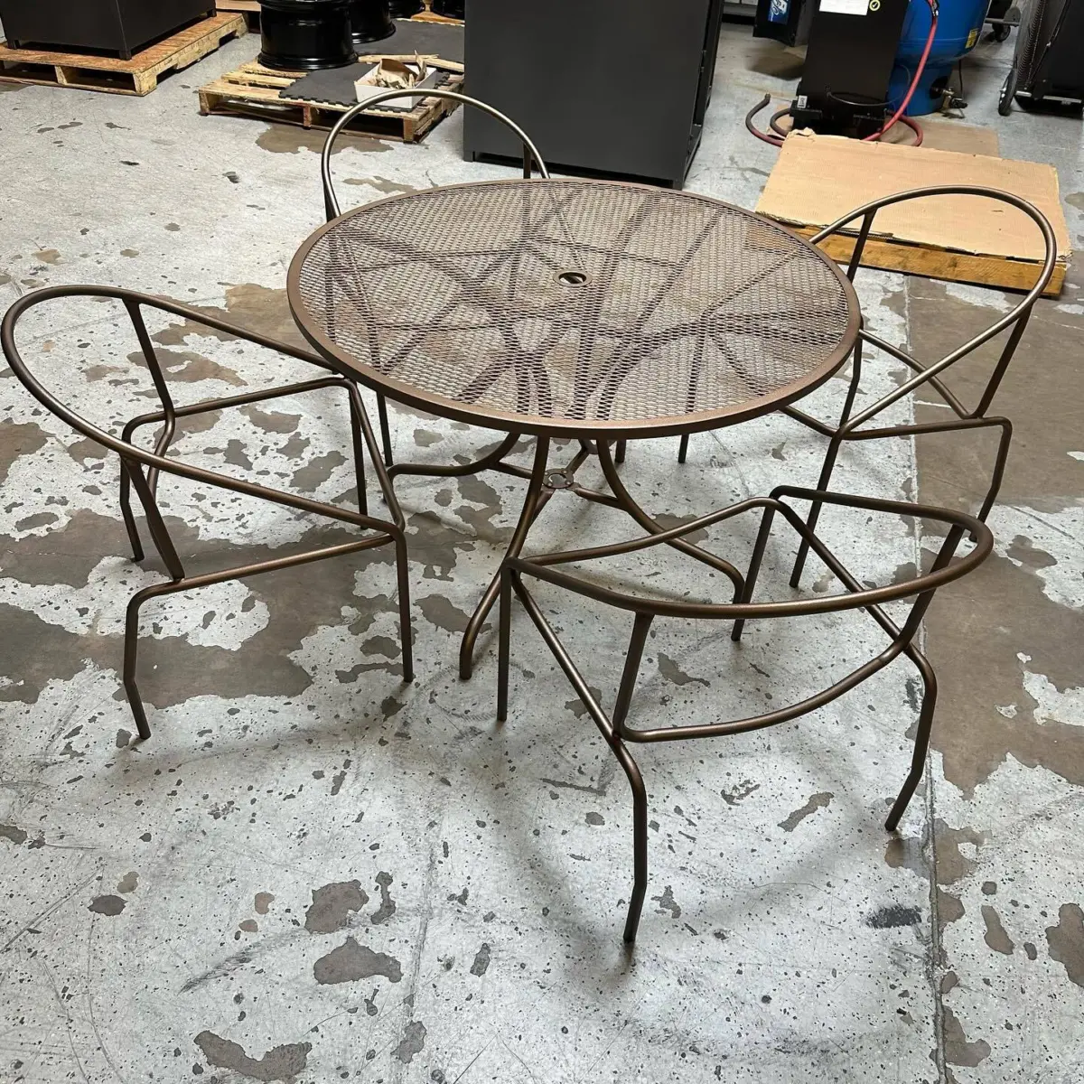 Patio set powder coated in a Zinc Primer and Empire Bronze, specially formulated for outdoor furniture