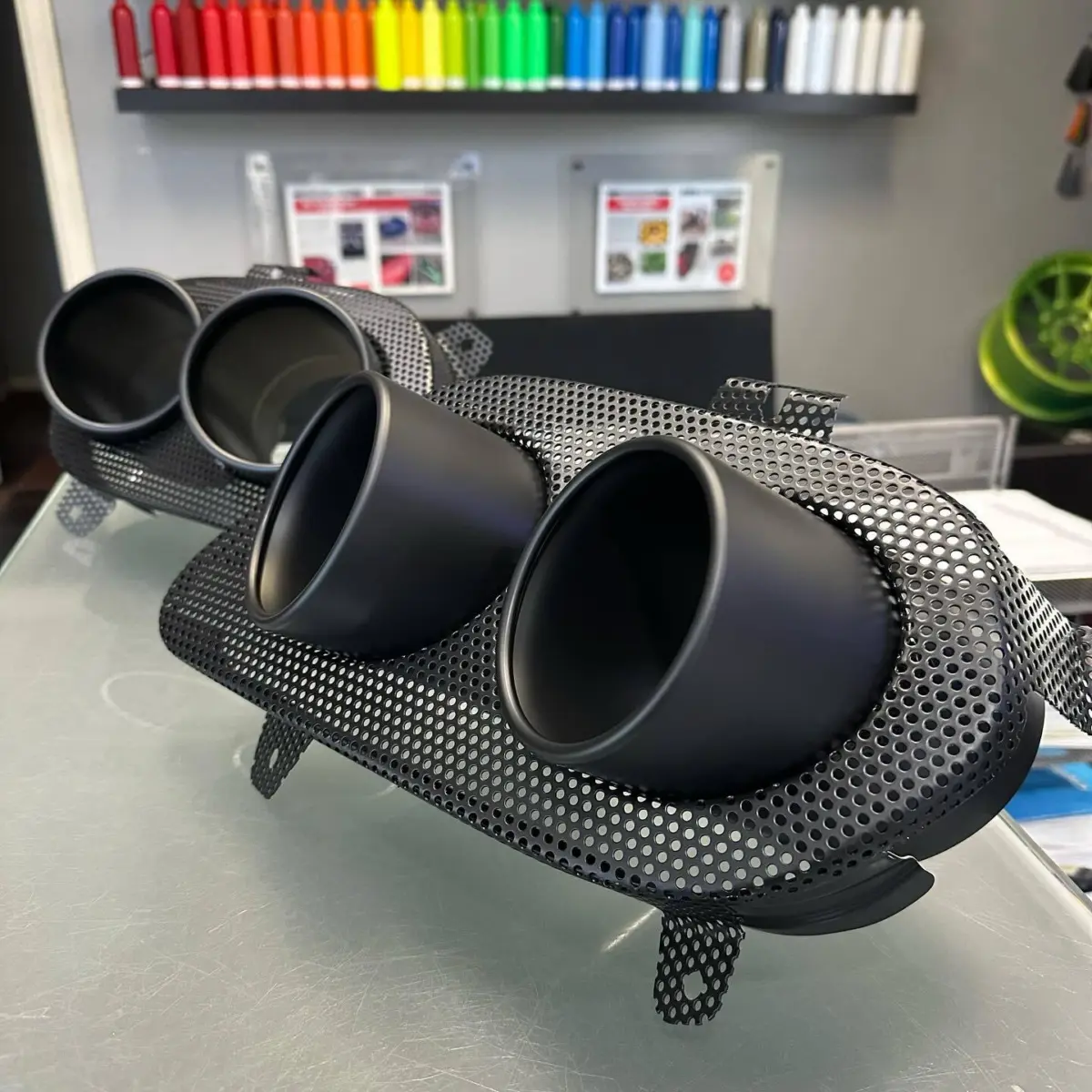 Ferrari 812 exhaust tips refinished in High Temp Glacier Black Cerakote