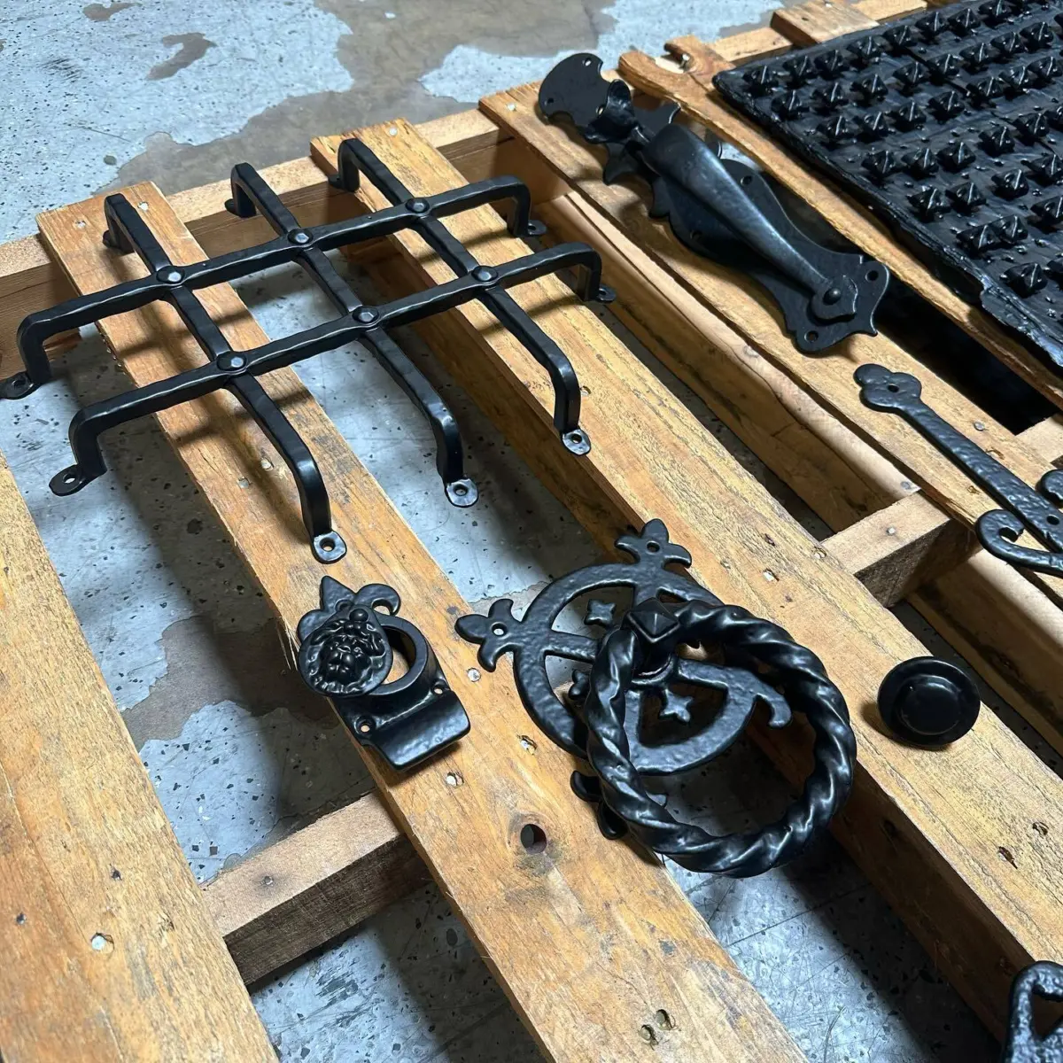 Custom door hardware refinished in Denim Black powder coat