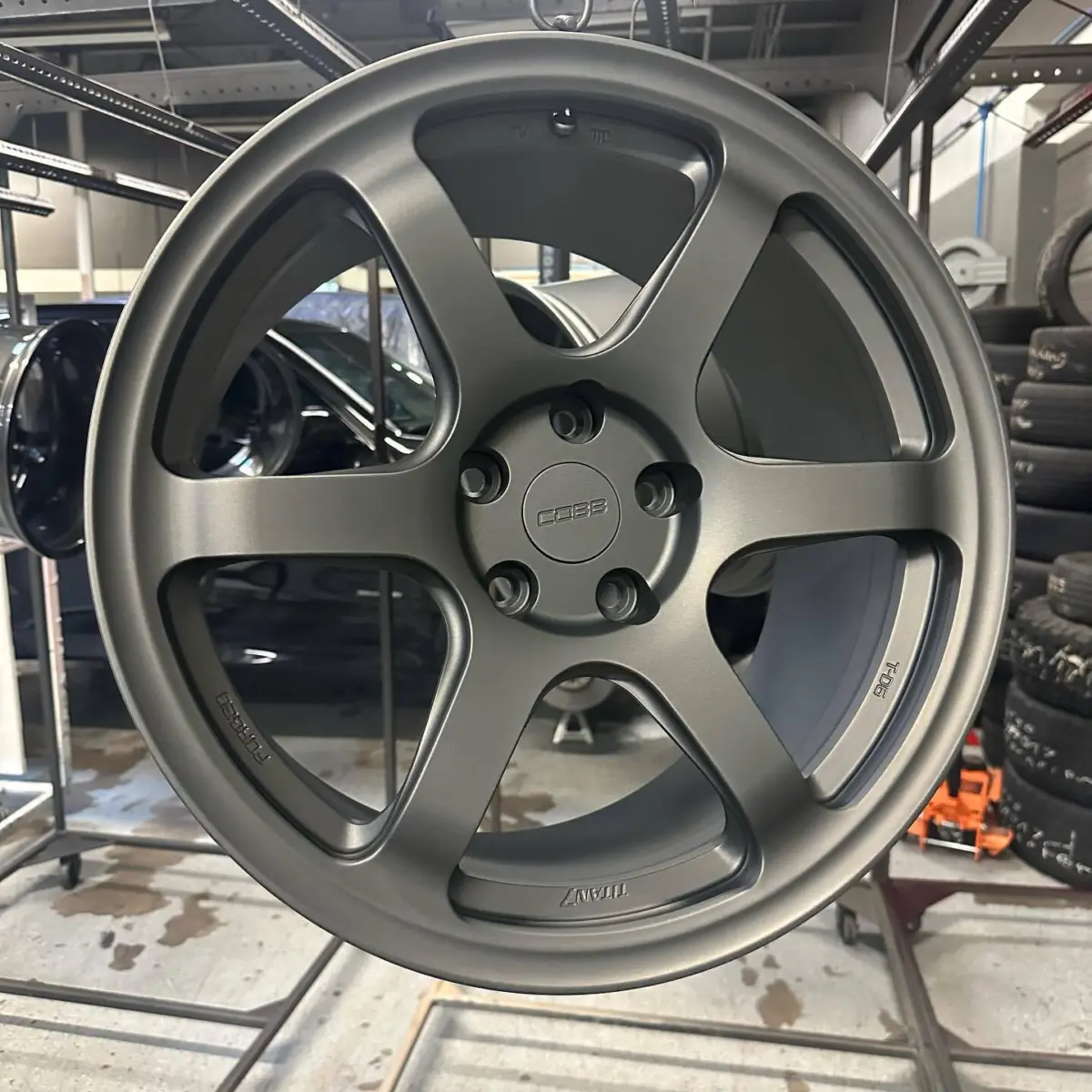 Custom Titan 7 wheels refinished in Argento 314 with Casper Clear