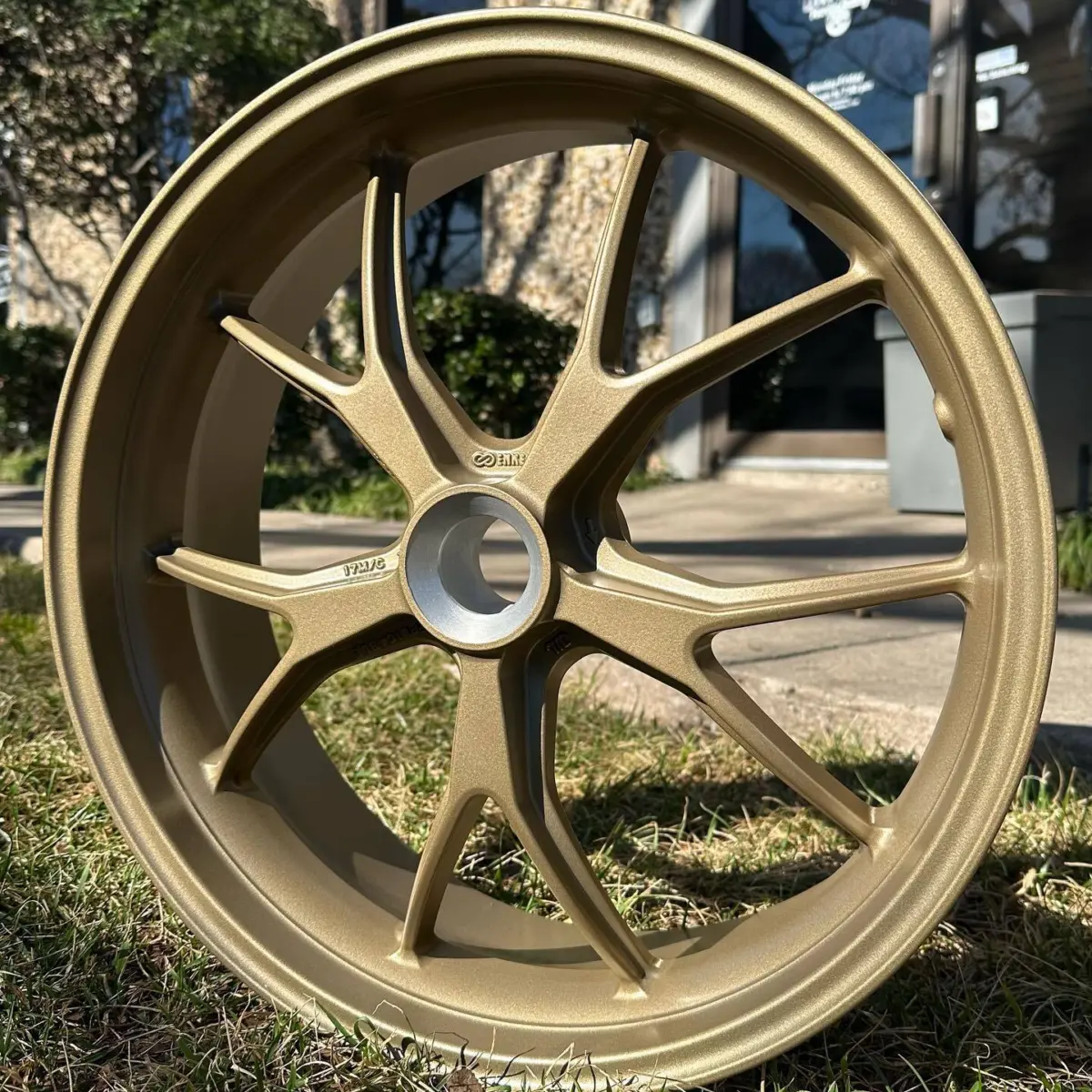 Ducati wheels refinished in Gold Haze with Fog Clear. Wheel bearings and tires serviced in house