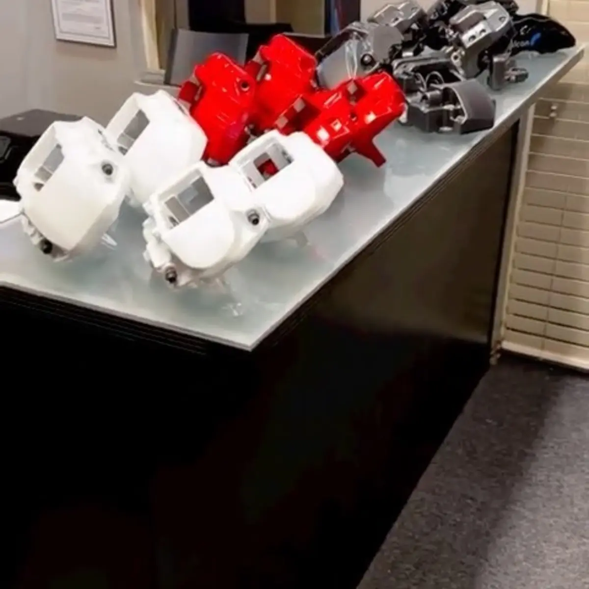 Genesis calipers refinished in Pearlized Violet with High Gloss clear. Infiniti q70 calipers refinished in House Red with High Gloss Clear. 2023 Mercedes SL55 AMG calipers refinished in Dark Metallic Gunmetal with High Gloss Clear. Mustang Roush