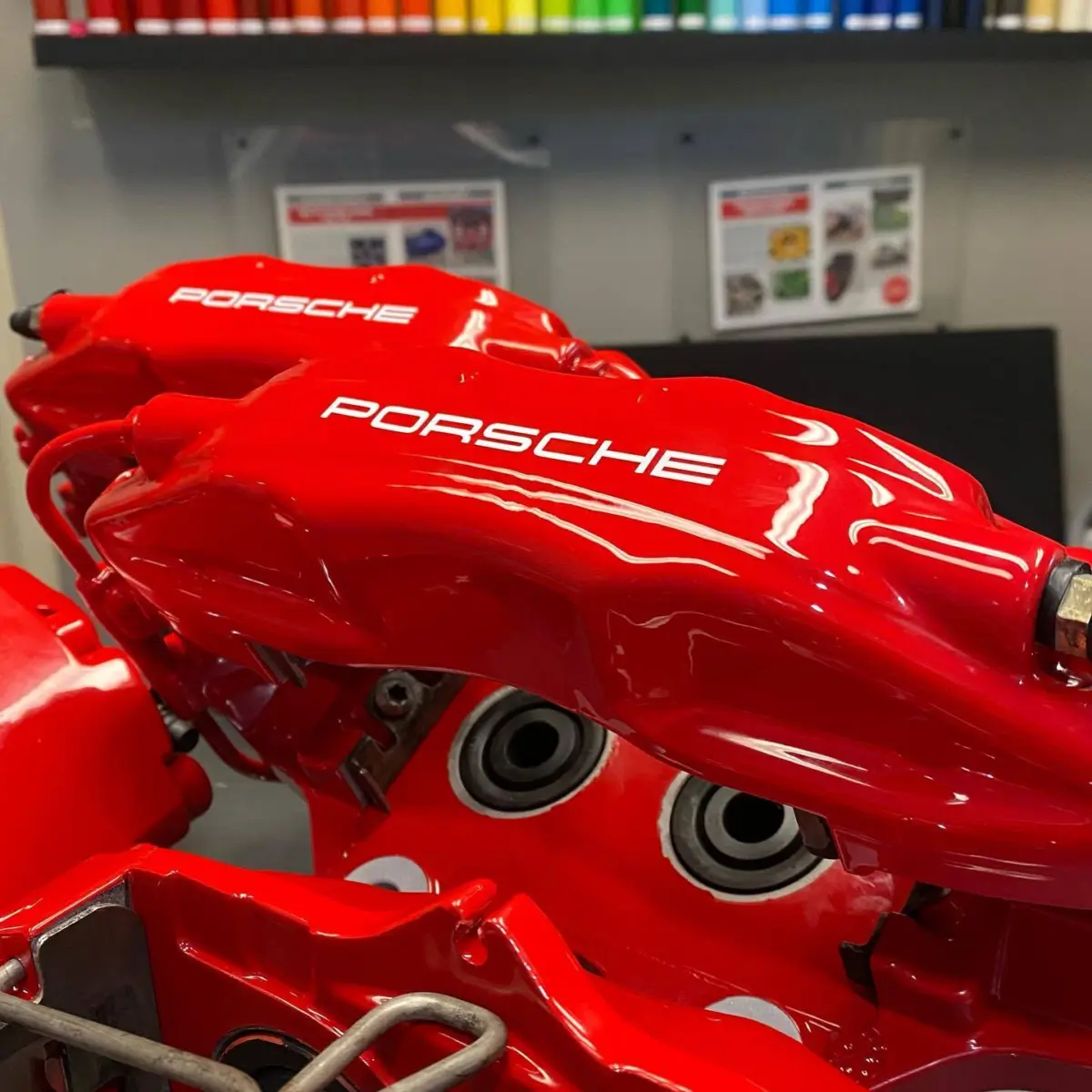 Porsche brake calipers refinished in an OEM Red with High Gloss clear for @apexautoco