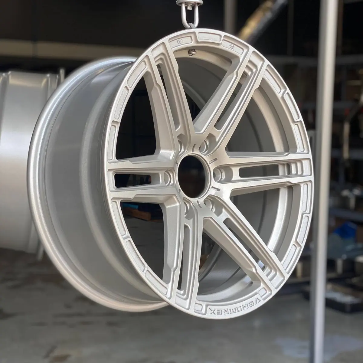 Venom wheels refinished in Satin Titanium with a Satin Clear
