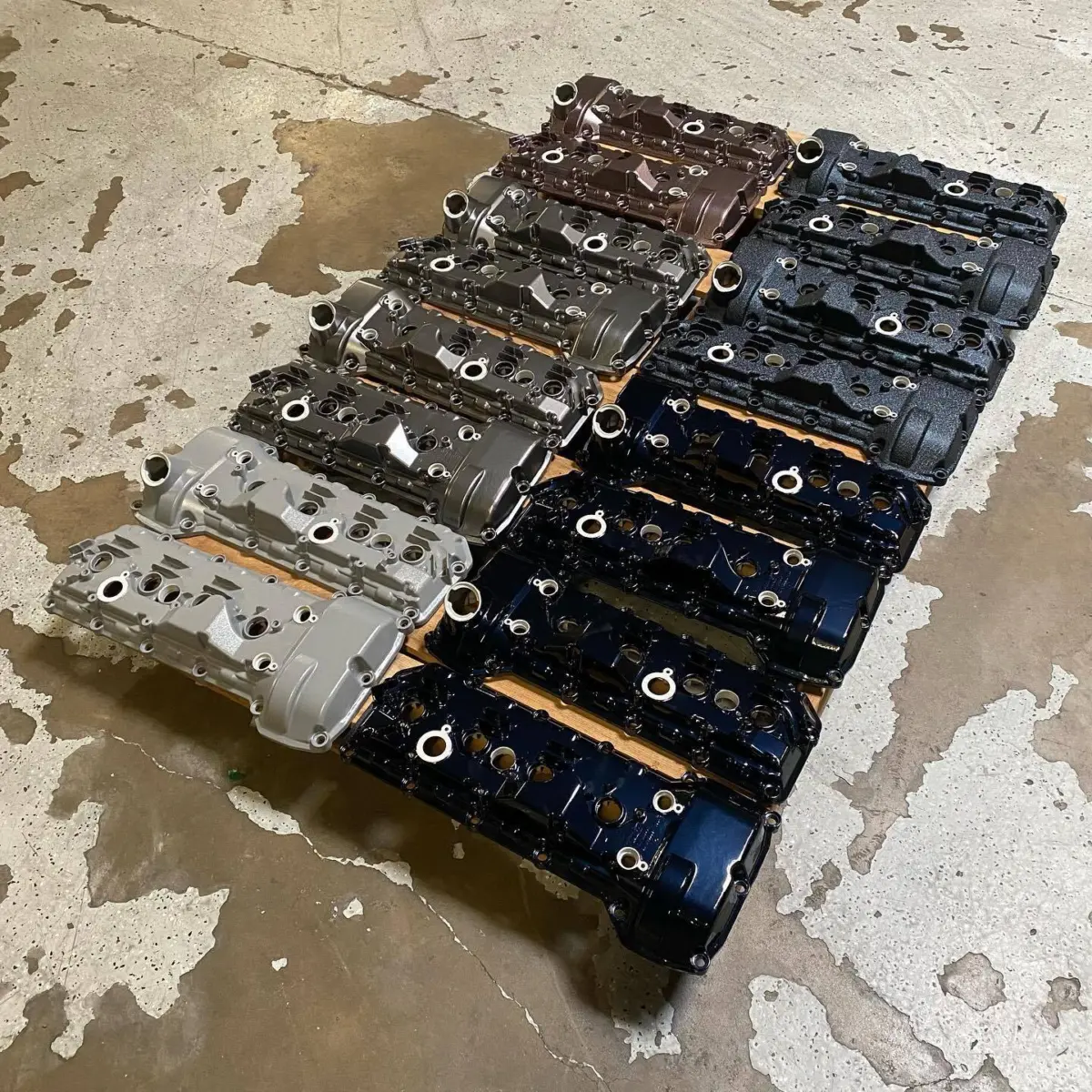 BMW valve covers refinished for @mporium_bmw. Pictured in Splatter Midnight, Moody Blue, Rhino, Gateway Grey, and Black Rose from @prismaticpowders