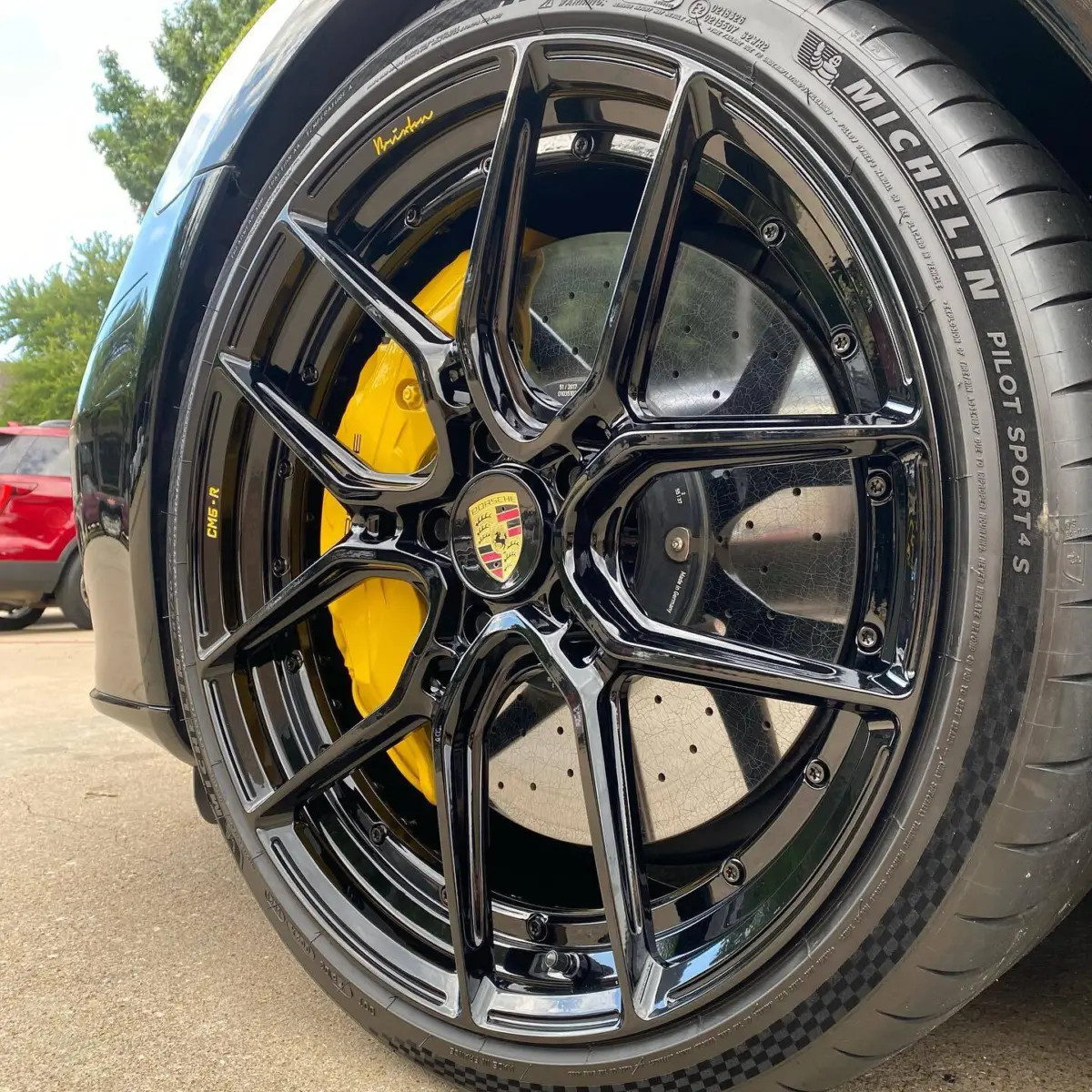 Porsche Panamera with Brixton Forged wheels rebuilt and refinished in Super Mirror Black with Hot Yellow accents