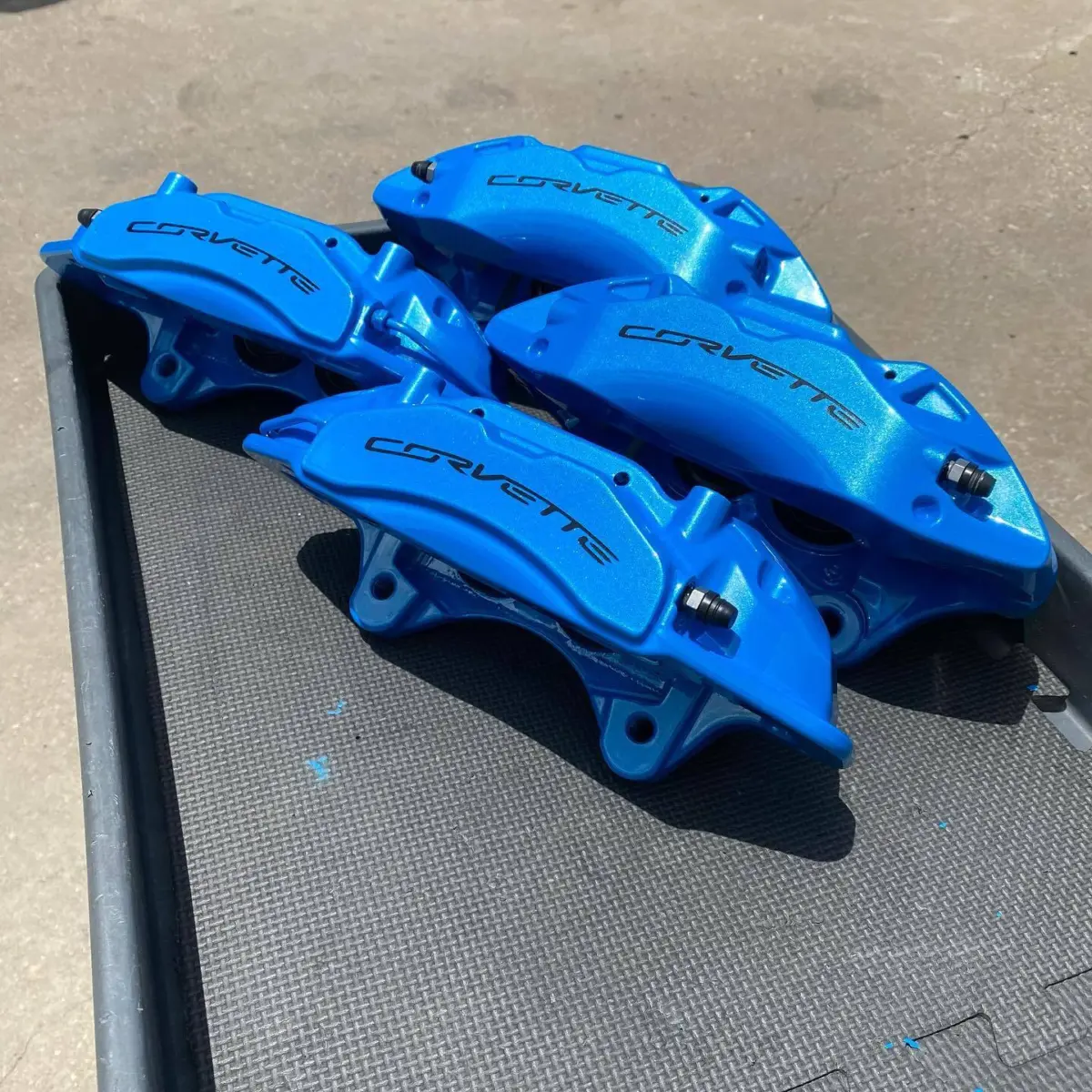 2023 Corvette brake calipers stripped down and powder coated Sparks Blue with High Gloss Clear