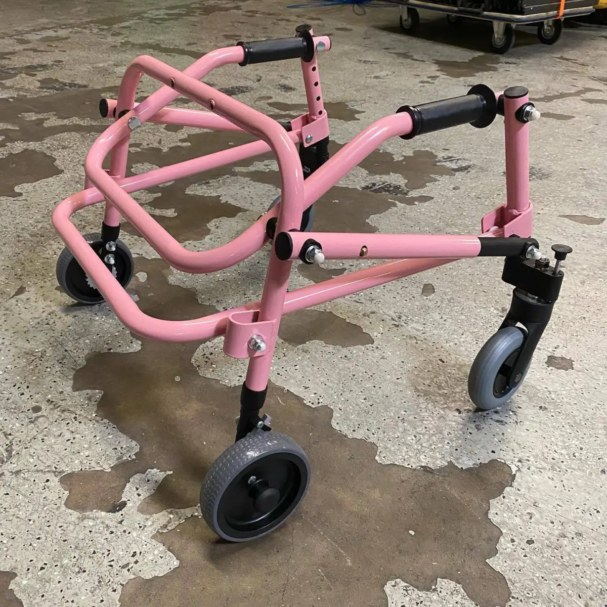 Nimbo posterior walker refinished in Light Pink Powder Coat and Graphite Black Cerakote