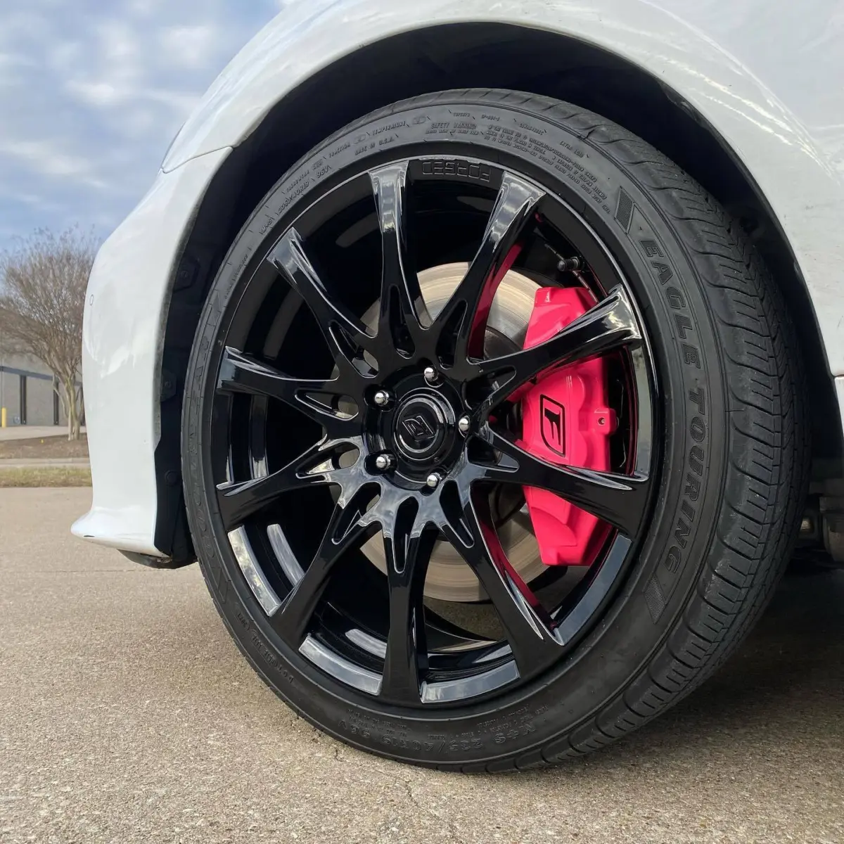 Lexus RC-F brake calipers powder coated in Sassy Pink and wheels in Gloss Black