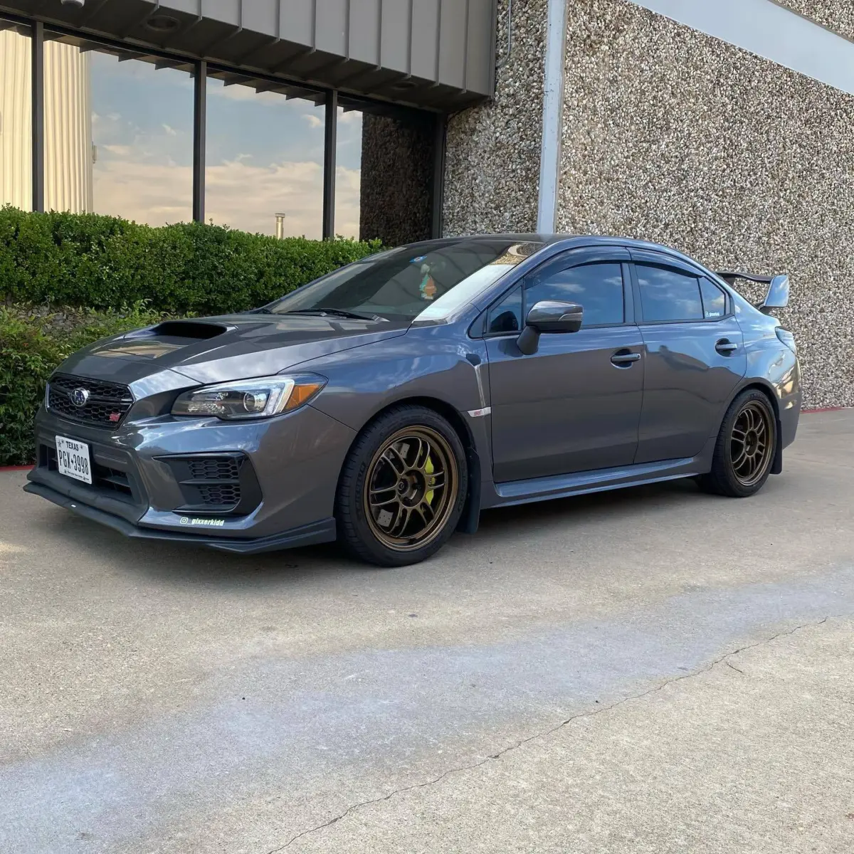 Subaru STI wheels refinished in a Golden Metallic Bronze with a 50% gloss clear