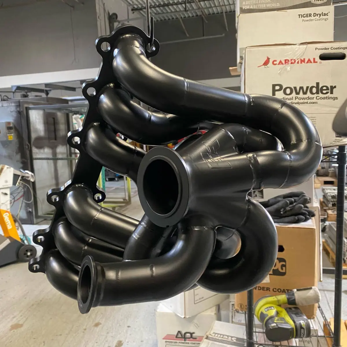 Toyota Supra 2JZ billet PHR Turbo Manifold refinished in Glacier Black Cerakote