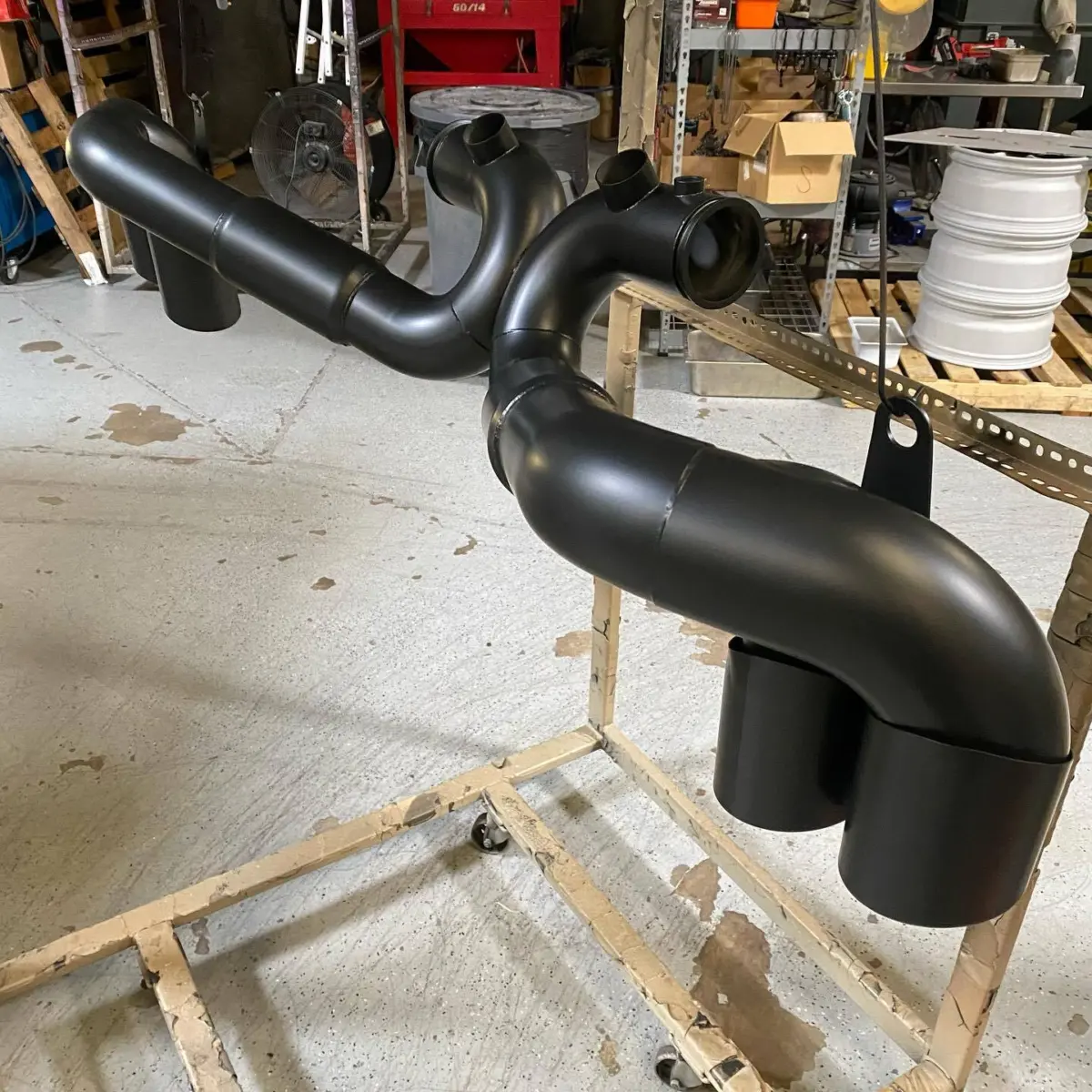 Porsche down pipe refinished in Glacier Black for @jotechmotorsports