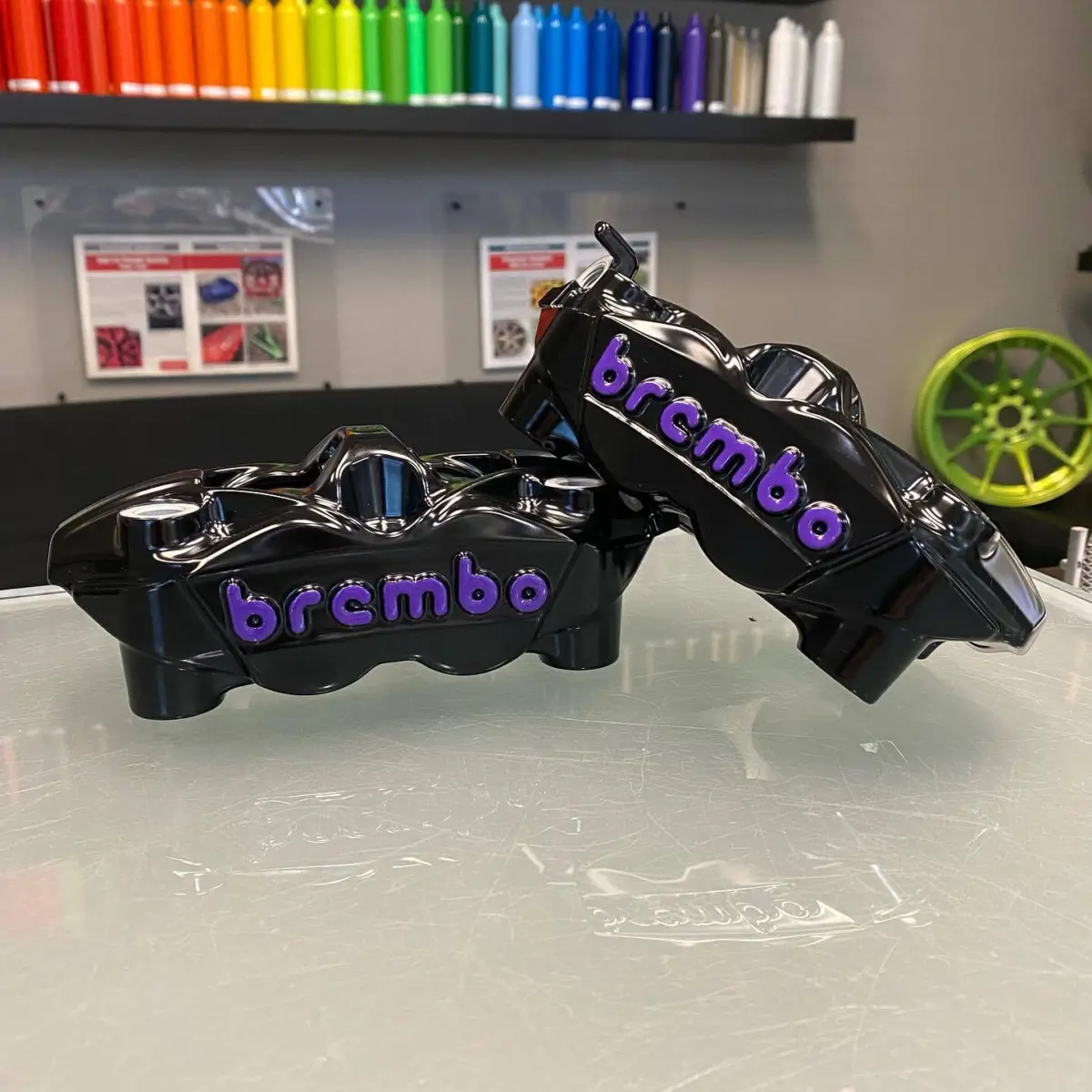 Harley Davidson brake calipers refinished in Semigloss Black with Crimson Purple