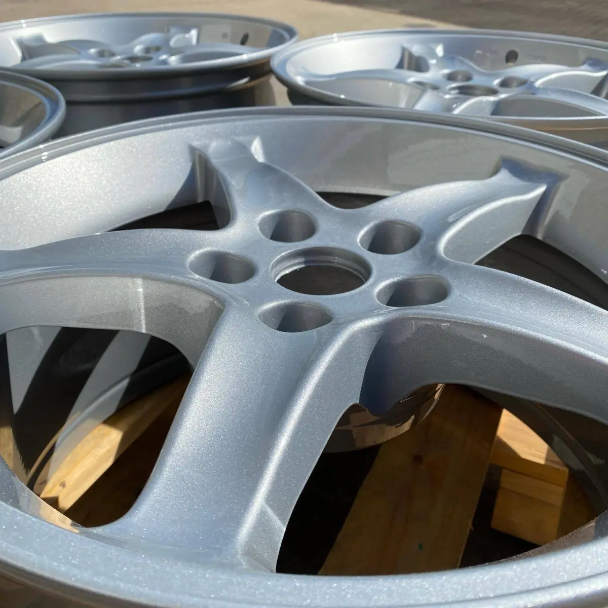 Huge transformation for these Cobra wheels, refinished in a Primer, Bengal Silver, and High Gloss Clear. Check out how they came in!