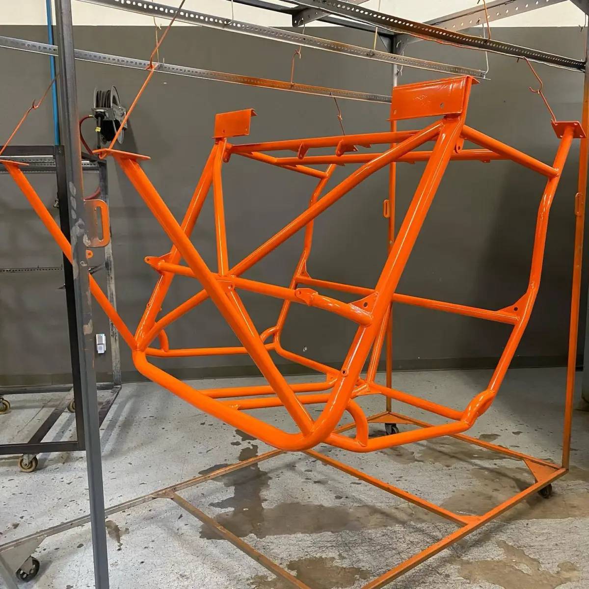 Jeep roll cage refinished in @prismaticpowders KTM Orange II with a Zinc Primer