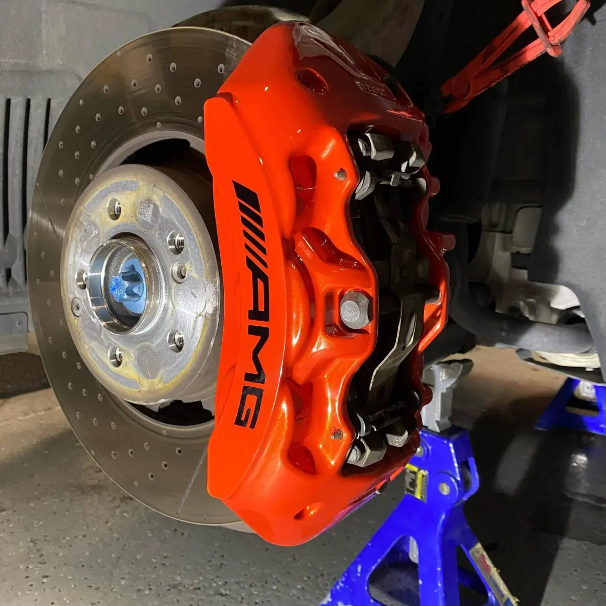 2021 AMG GT 43 brake calipers refinished in Fire Orange, wheels refinished in Matte Black