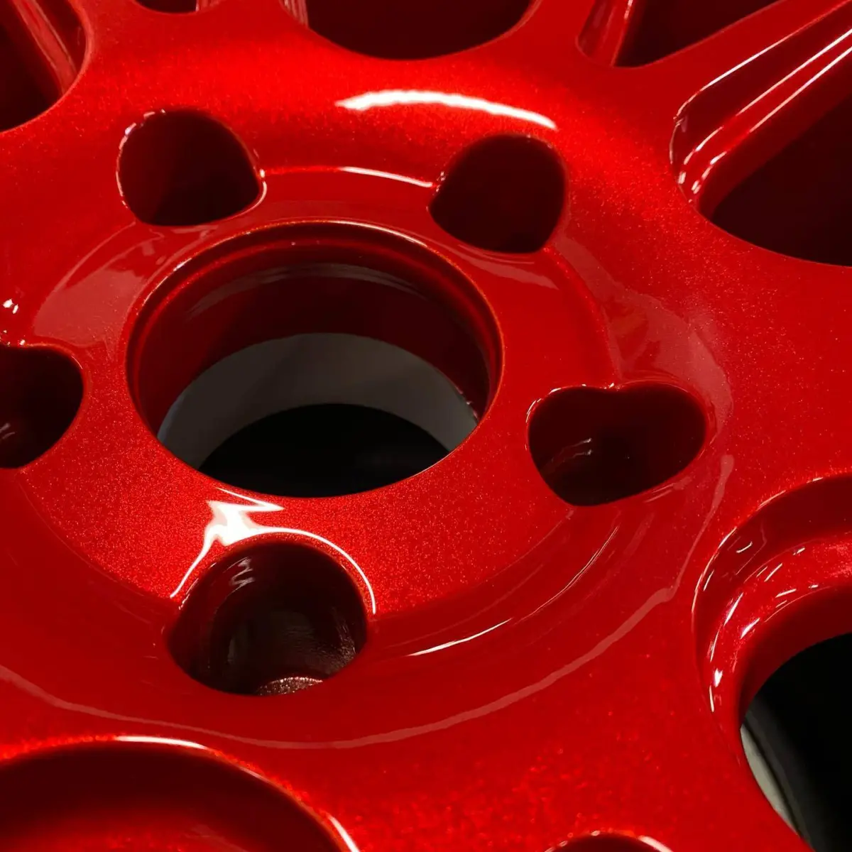 These wheels came in with the hubs coated, would not balance, sensors installed in the wrong places, tires in the wrong direction, drips and cracks in the coating done over the original blue finish. We carefully stripped it down to bare metal,