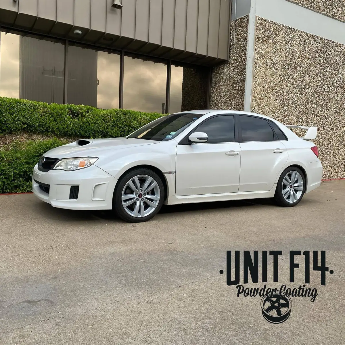 Subaru WRX in wheels refinished in Porsche Silver