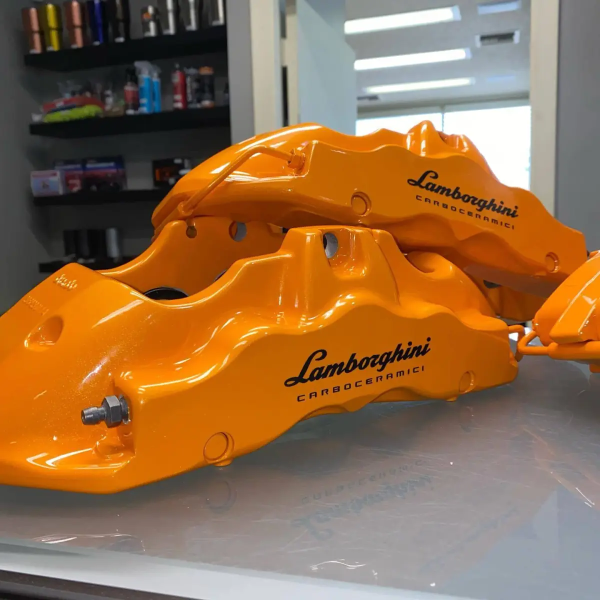 Lamborghini Huracan brake calipers refinished in a metallic golden orange for @majestic_huracan