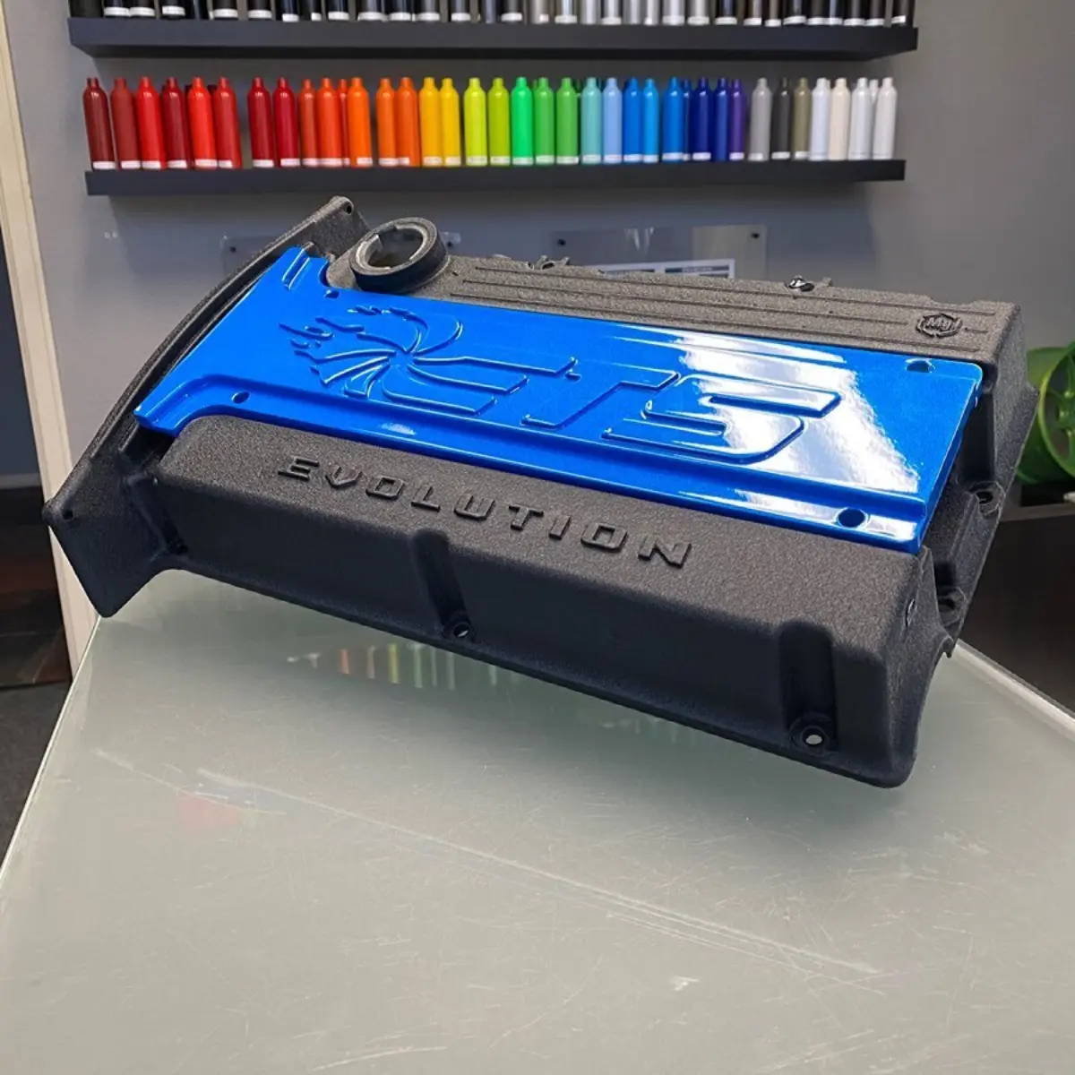 Mitsubishi valve cover refinished in wrinkle black with coil cover in illusion lite blue