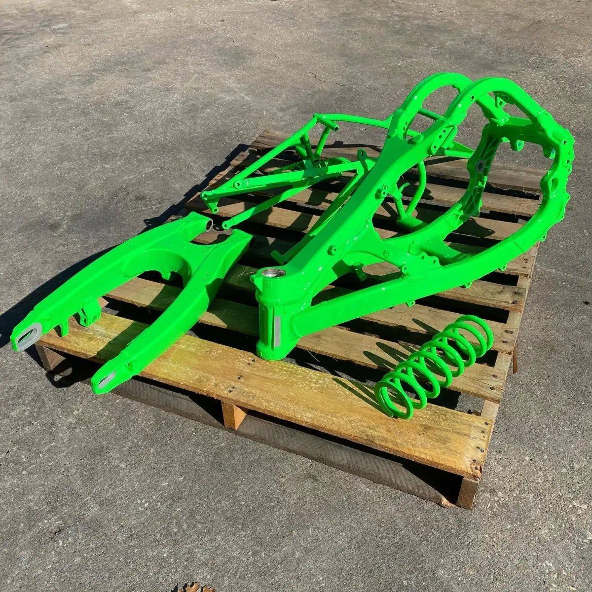 Dirt bike parts refinished in Neon Green