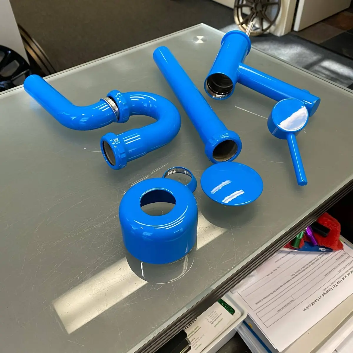 Sink hardware refinished in Playboy Blue