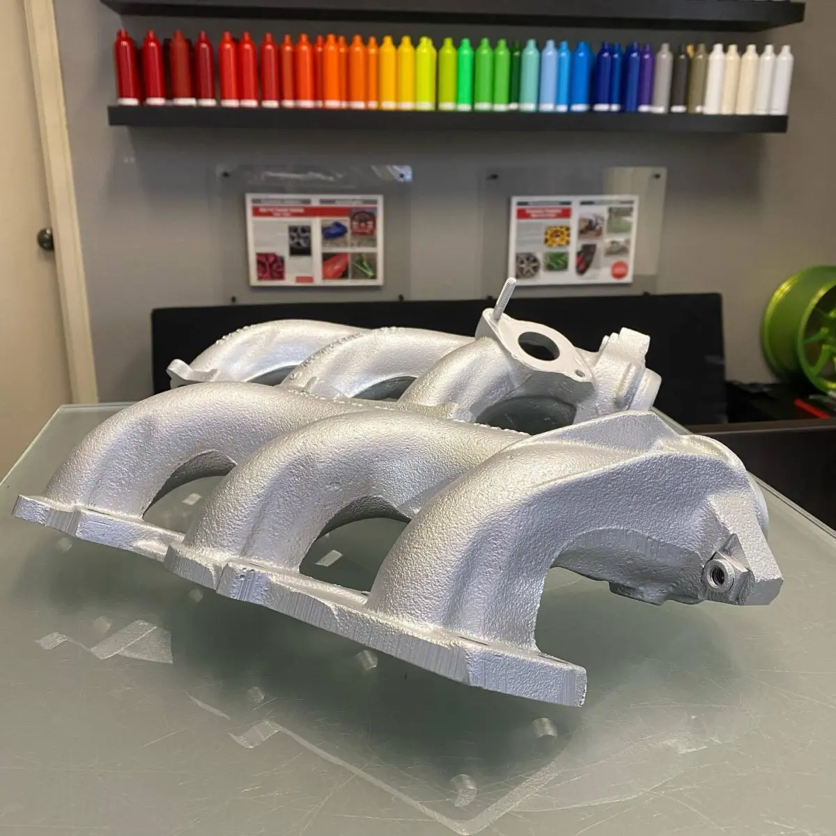 Exhaust manifolds refinished in Glacier Silver Cerakote for @classyhouseproductions