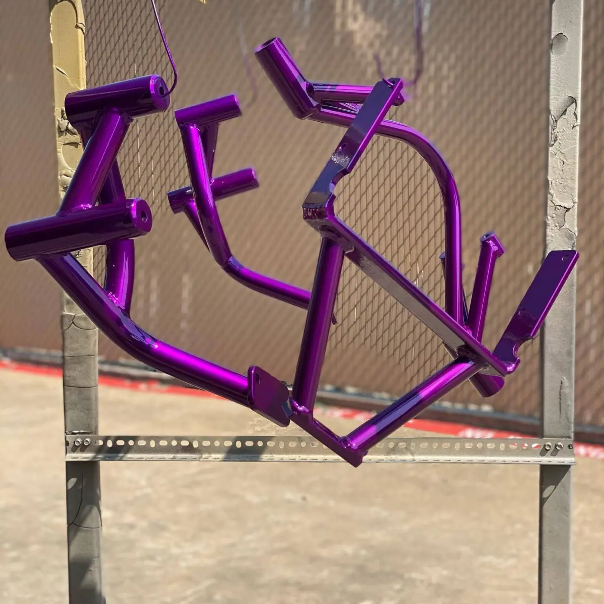 Motorcycle crash cage refinished in Illusion Violet