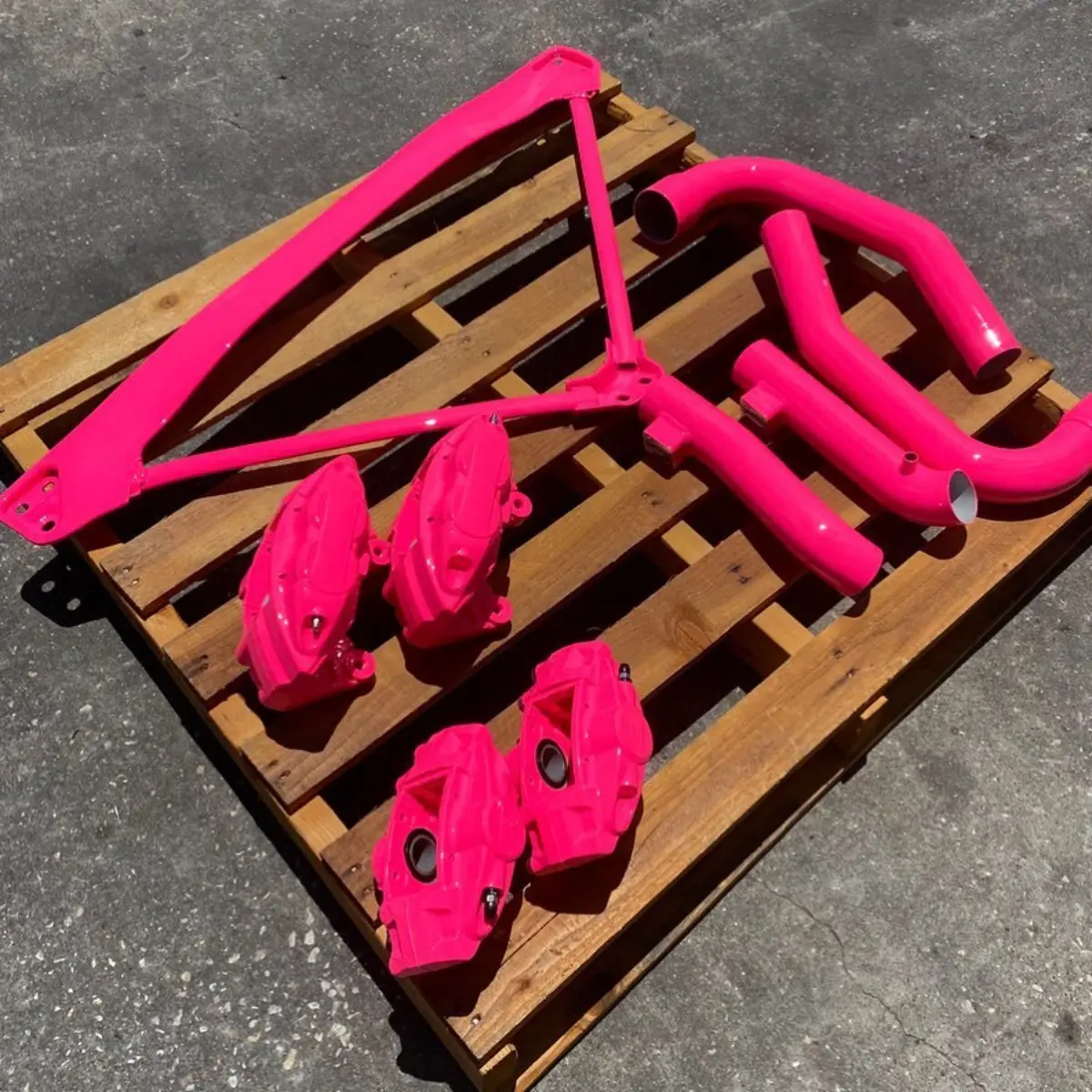 Nissan 350z parts refinished in a 3-stage Bright Pink
