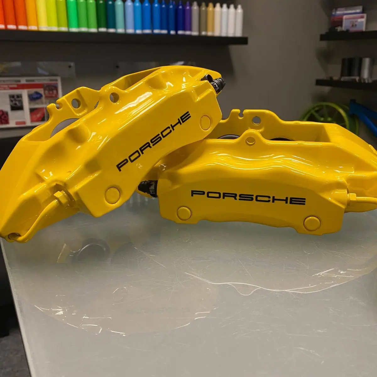 Porsche Calipers rebuilt and refinished in Hot Yellow