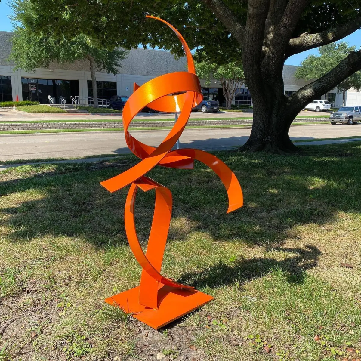 Metal sculpture refinished in Illusion Orange